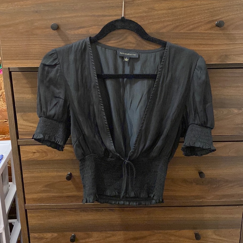 Dolls Kill | “Dance & Marvel” black deep v blouse w/ tie and puff sleeve detail